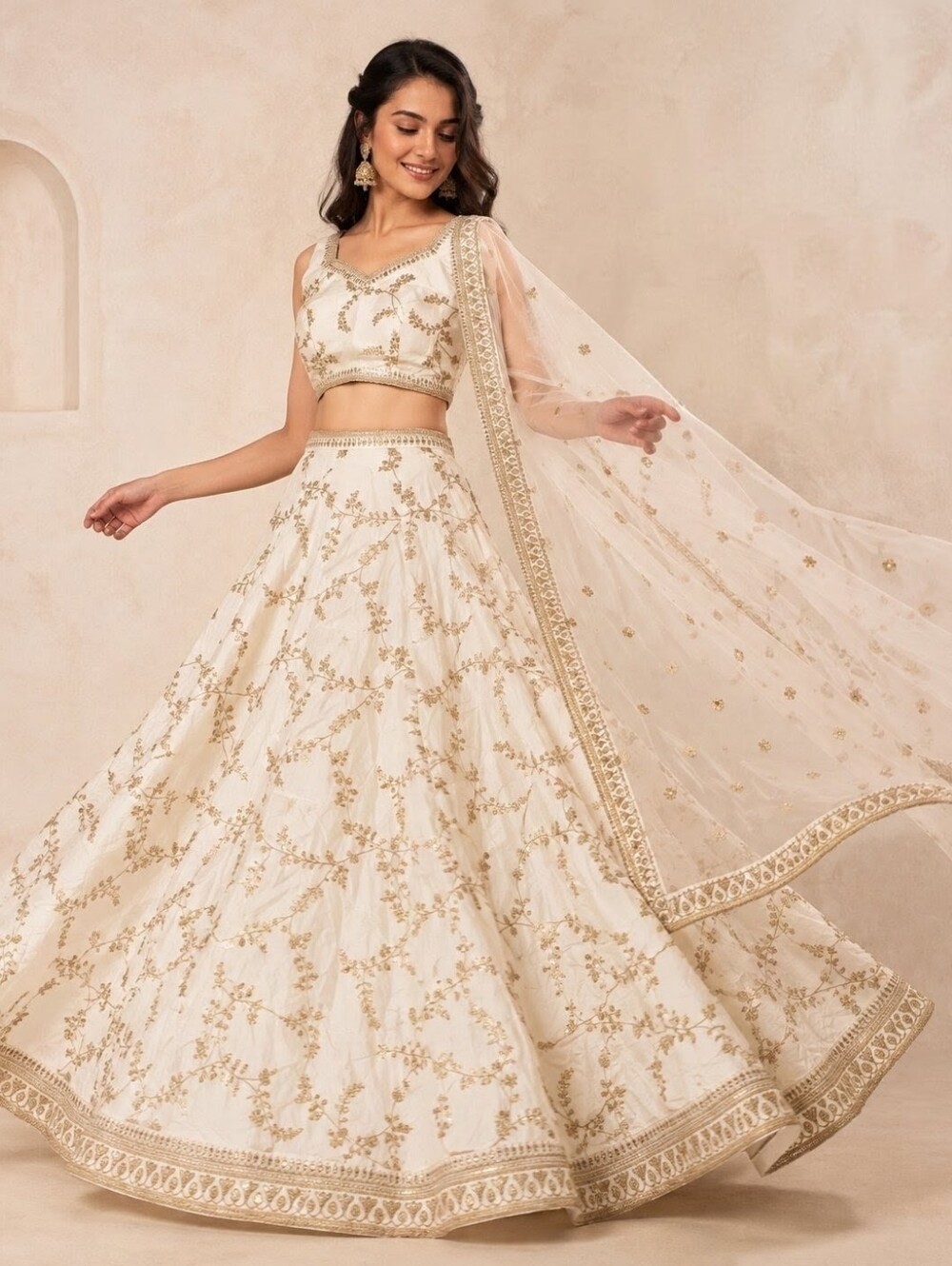 Ivory Lehenga Choli with Golden Embroidery – US 10